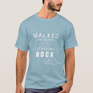 Light blue  men's Christian typography T Shirt with the words: I haven't walked on water yet but I'm standing on the Rock.