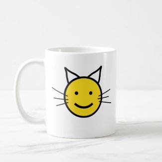 Coffee Mug with smiley emoji face turned into a smiling cat.
